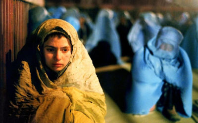 ‘Osama’ Tells the Story of a Girl Who Disguises Herself as a Boy to Find a Job