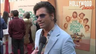 John Stamos Spills Secrets on ‘The Beach Boys’ at Premiere